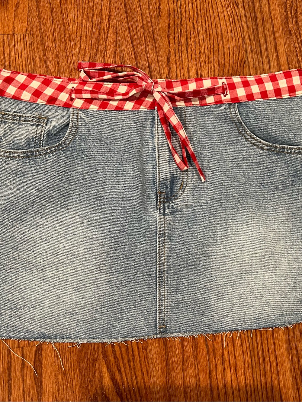 Beginning Boutique Light Blue Denim Mini Skirt with Red Gingham Tie